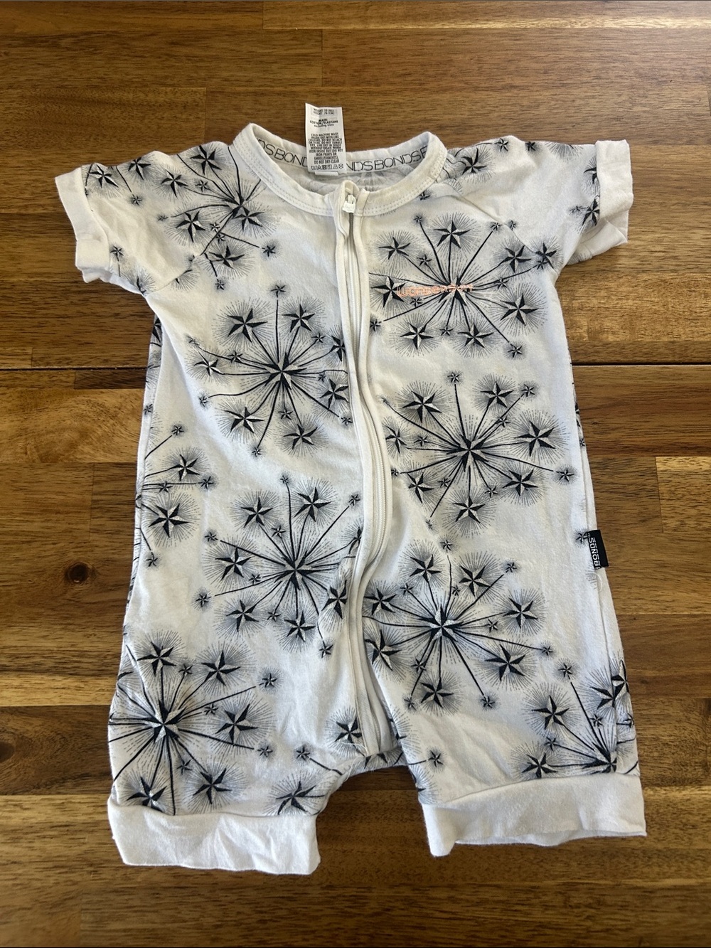 Bonds White Footie Romper with Black Starburst Print